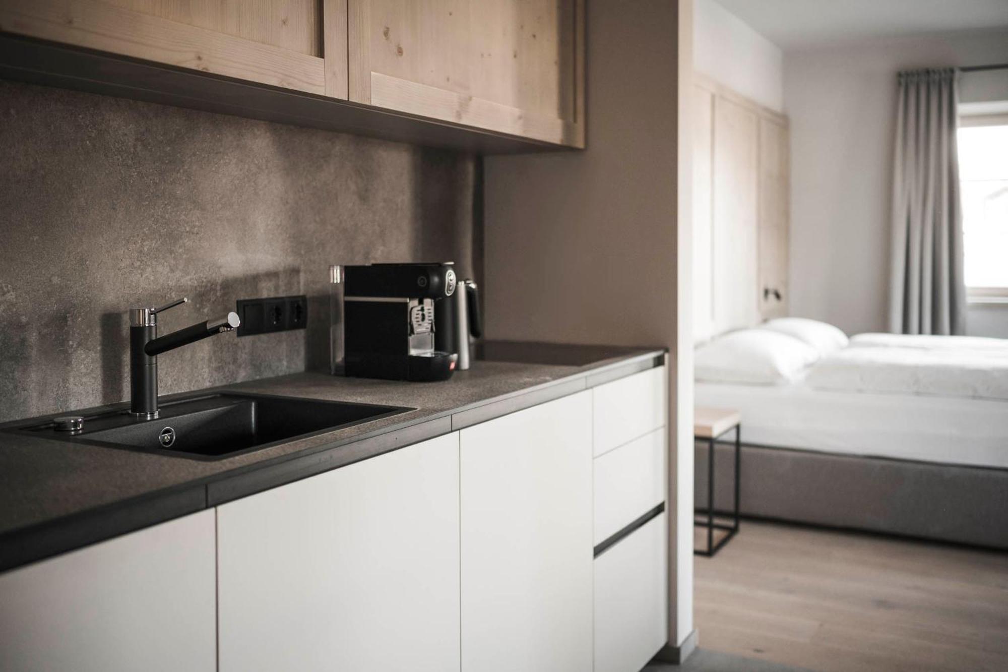 Hofergut Suites & Apartments Riscone Esterno foto